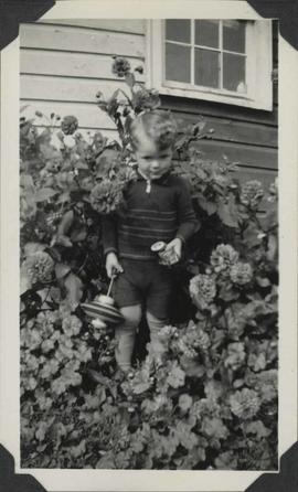 Boy with toys in hand