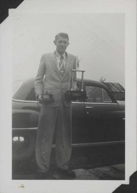 George Burns with trophys