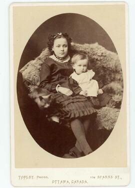 Young girl sittiing with a baby beside her, Photographer Topley, Ottawa, On.