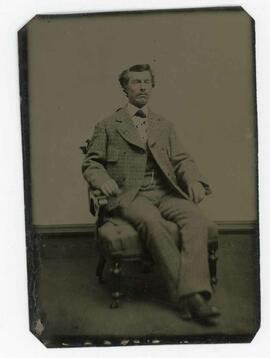 Tin Type of gentleman sitting