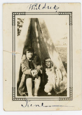 Young woman and child in a tent, inscribed “Mildred/Irene”.