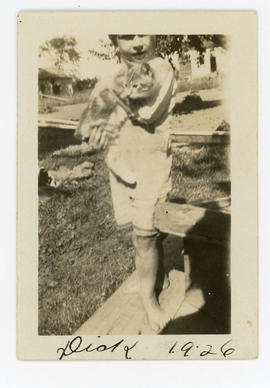 Boy holding a cat, inscribed “Dick 1926