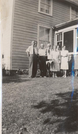 Group in front of house