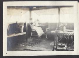 Lady in cabin with shutters up